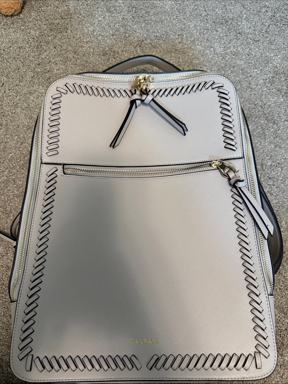Calpak Cream Backpack with Black Trim and Gold Hardware